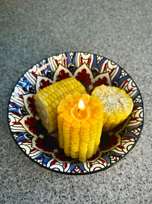 Enhance your home with a beautifully crafted corn-shaped beeswax candle. Made from 100% pure, ethically sourced New Zealand beeswax, this candle offers a clean, slow burn with a naturally soft honey aroma. Free from artificial fragrances, dyes, and toxins, it is a safe and eco-friendly choice for any space. With its playful sculptural form and warm golden glow, this candle adds character, warmth, and natural charm to any room.