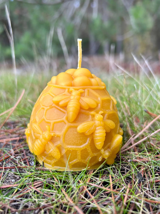 Handcrafted from 100% pure New Zealand beeswax, the Honey Hive Candle celebrates the beauty and importance of bees. Designed in the shape of a honeycomb dome and detailed with sculpted bees, it brings a warm, nature-inspired touch to any home. Each candle is hand-poured in small batches, offering a gentle, naturally sweet honey aroma without artificial fragrances, dyes, or additives.