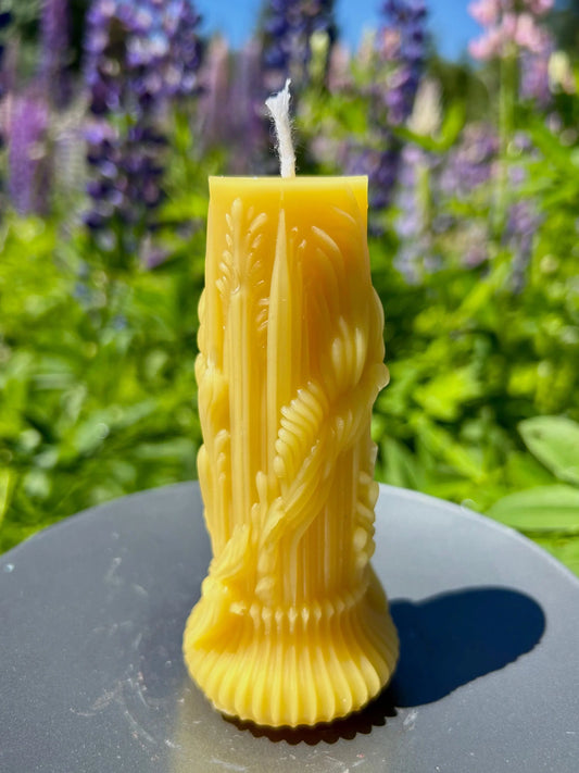 Our Heirloom Honey Pillar Candle is hand-poured using 100% pure beeswax, featuring a timeless pillar shape with subtle floral detailing.