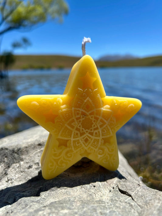Our Honey Star Mandala Candle is hand-poured using 100% pure beeswax, featuring an intricate mandala design framed within a softly glowing star shape. Each candle is hand-poured in small batches to ensure quality, consistency, and a smooth, even burn.