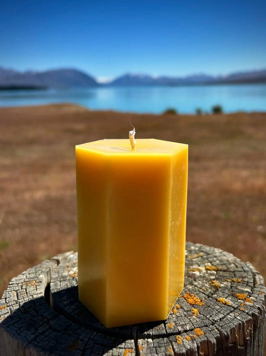 Sculpted in a clean, faceted form, the Aurum Pillar Candle is crafted from 100% pure New Zealand beeswax. Its naturally rich golden tone and soft honey notes come directly from the wax itself, with no added fragrance or additives. Designed for a slow, steady burn, Aurum brings a quiet sense of warmth and elegance to any space — a timeless candle made to be both functional and beautiful.