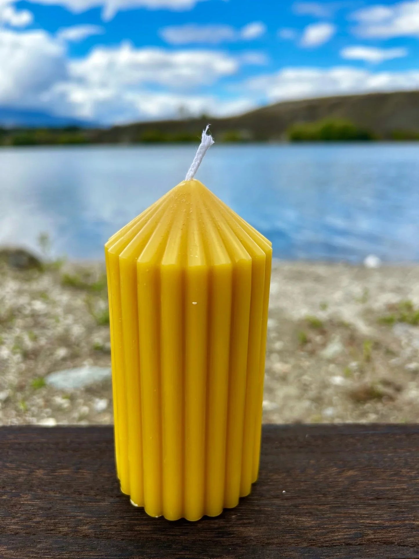 Enhance your home with the Golden Column beeswax candle, a tall and elegant sculptural piece handcrafted from 100% pure, ethically sourced New Zealand beeswax. Designed to burn cleanly and slowly, it releases a naturally soft honey aroma with no added fragrances, dyes, or toxins.

Available in four sizes — Small, Small Tall, Medium, and Large — the Golden Column candle suits a variety of spaces and styling needs. Whether used as a subtle accent or a striking centrepiece, its fluted column design and warm go
