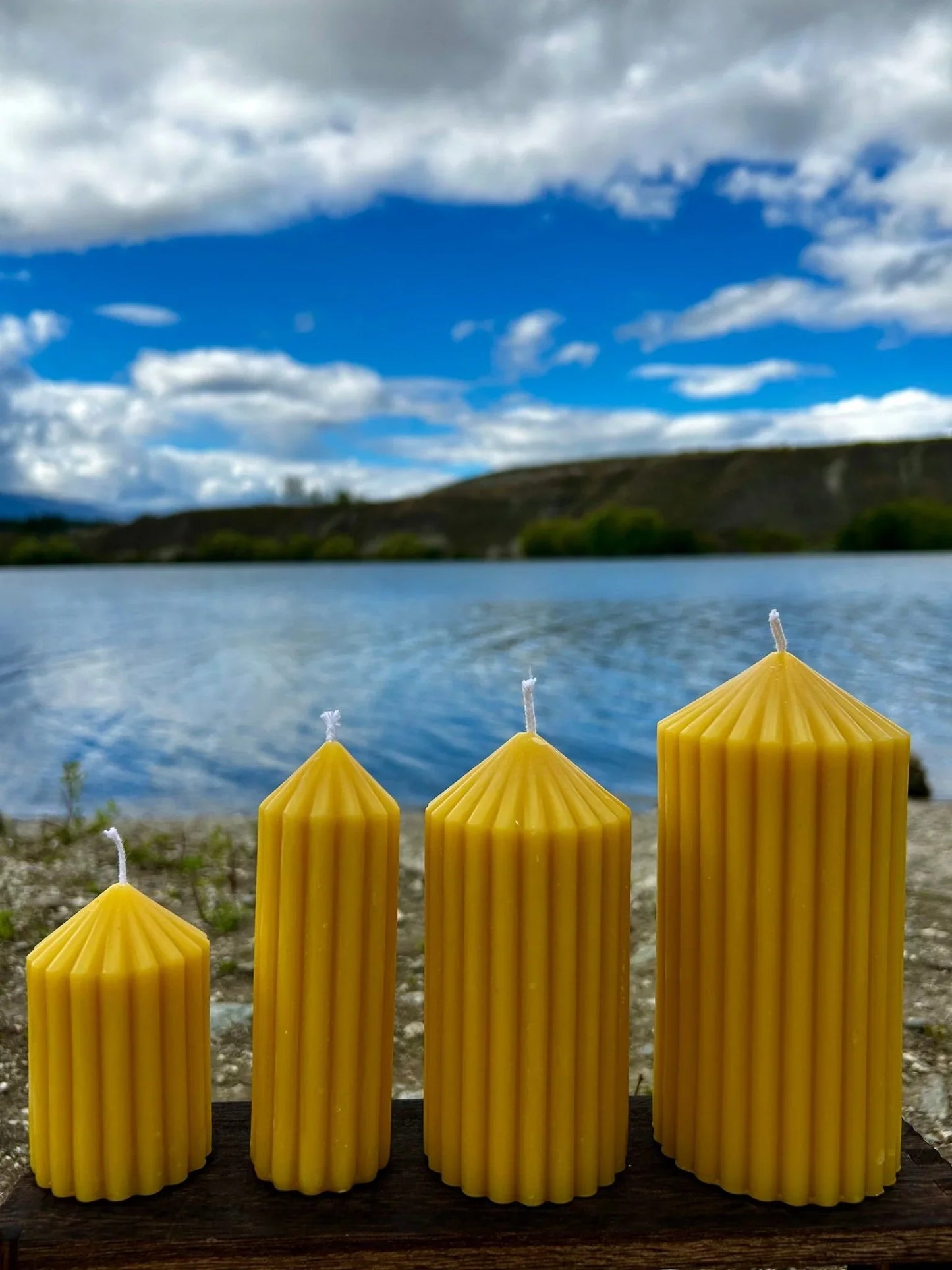 Enhance your home with the Golden Column beeswax candle, a tall and elegant sculptural piece handcrafted from 100% pure, ethically sourced New Zealand beeswax. Designed to burn cleanly and slowly, it releases a naturally soft honey aroma with no added fragrances, dyes, or toxins.

Available in four sizes — Small, Small Tall, Medium, and Large — the Golden Column candle suits a variety of spaces and styling needs. Whether used as a subtle accent or a striking centrepiece, its fluted column design and warm go