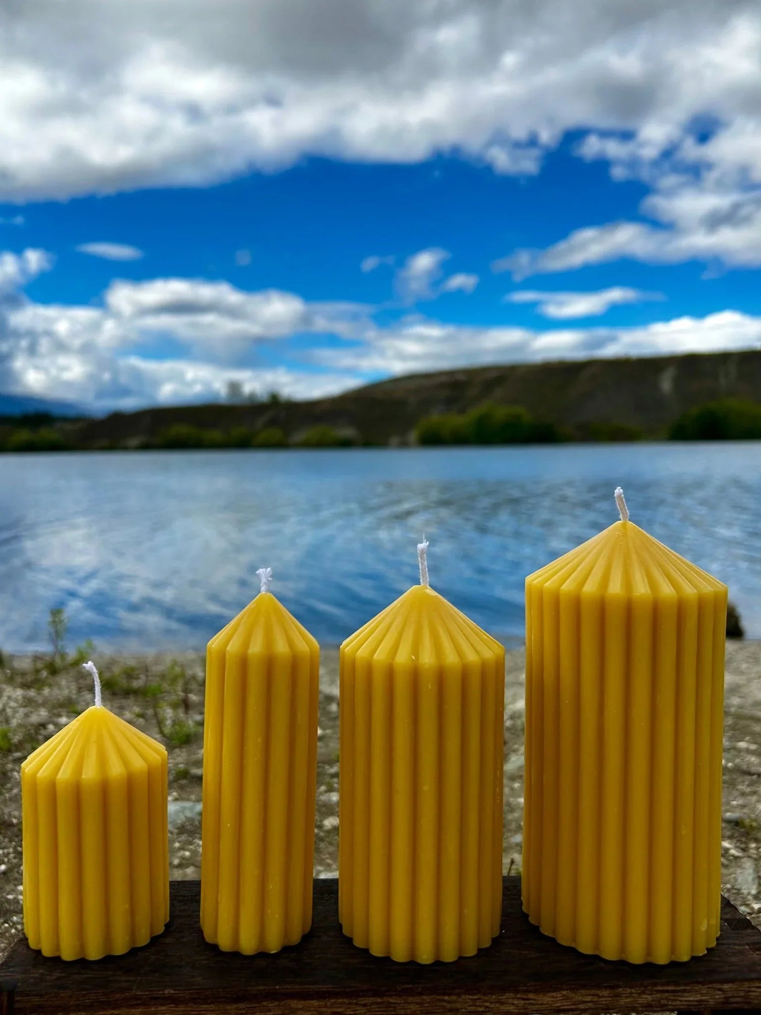 Enhance your home with the Golden Column beeswax candle, a tall and elegant sculptural piece handcrafted from 100% pure, ethically sourced New Zealand beeswax. Designed to burn cleanly and slowly, it releases a naturally soft honey aroma with no added fragrances, dyes, or toxins.

Available in four sizes — Small, Small Tall, Medium, and Large — the Golden Column candle suits a variety of spaces and styling needs. Whether used as a subtle accent or a striking centrepiece, its fluted column design and warm go
