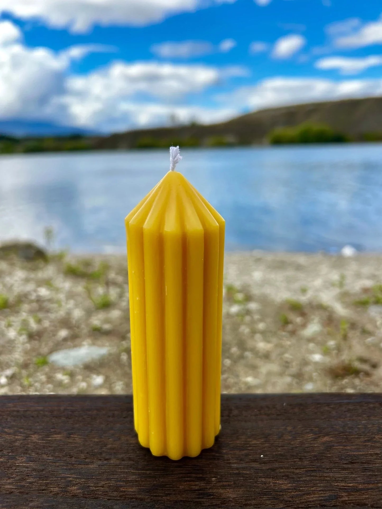 Enhance your home with the Golden Column beeswax candle, a tall and elegant sculptural piece handcrafted from 100% pure, ethically sourced New Zealand beeswax. Designed to burn cleanly and slowly, it releases a naturally soft honey aroma with no added fragrances, dyes, or toxins.

Available in four sizes — Small, Small Tall, Medium, and Large — the Golden Column candle suits a variety of spaces and styling needs. Whether used as a subtle accent or a striking centrepiece, its fluted column design and warm go
