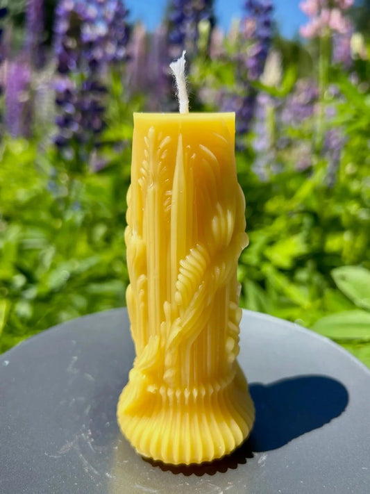 Our Heirloom Honey Pillar Candle is hand-poured using 100% pure beeswax, featuring a timeless pillar shape with subtle floral detailing.